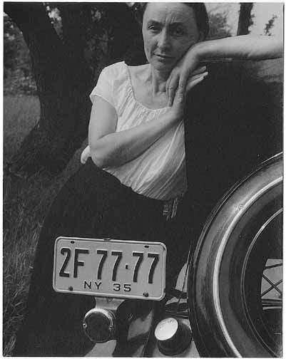 Photo of Georgia O'Keeffe taken by Alfred Stieglitz at Lake George